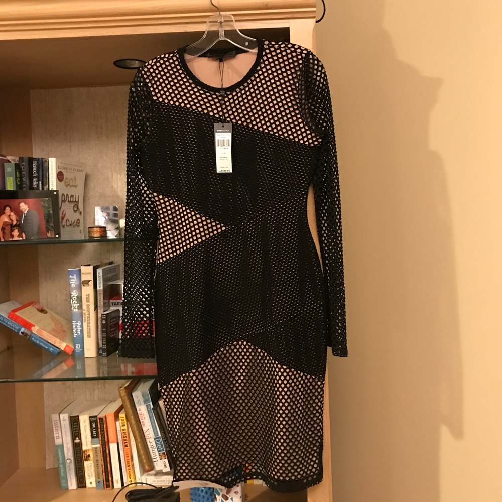 Lines open crocheted dress. NWT